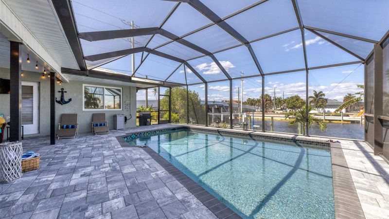 Enjoy the pool overlooking the canal