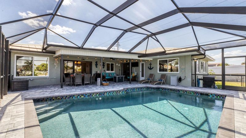 Enjoy the pool overlooking the canal