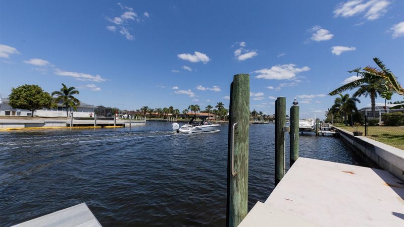 Major artery of the Punta Gorda canals leading out to Charlotte Harbor makes for fun boat watching all day. Dock Size 6' x 30' (Boat lift not available)