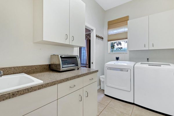 Full size washer and dryer in the laundry room