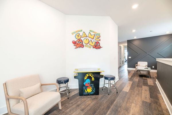 Head upstairs to the loft area where you will find a nostalgic Pac-Man arcade as well as Xbox One with two controllers