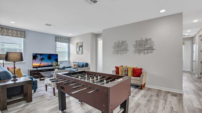 Loft
65" Roku TV
Foosball