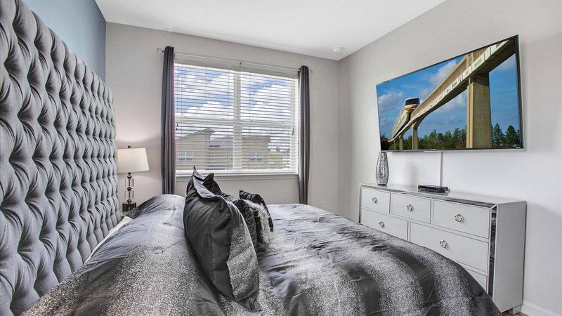 King Suite Bedroom 6 (Angle)
65" Roku TV