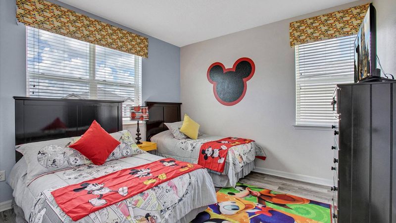 Twin/Double Bedroom 4 Upstairs
Shared Bathroom-Shower
Mickey Theme