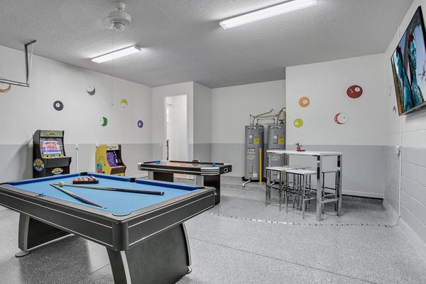 Game Room
65" Smart TV
Pool Table
Air Hockey
2 Video Arcades