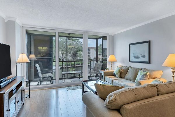 Bright and comfortable living room space with sleeper sofa