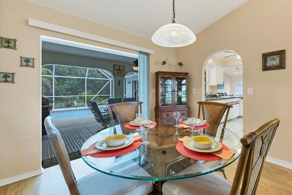 Seating for 4 at the dining table overlooking the lanai