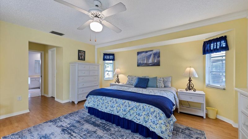 Master bedroom with king bed and ensuite