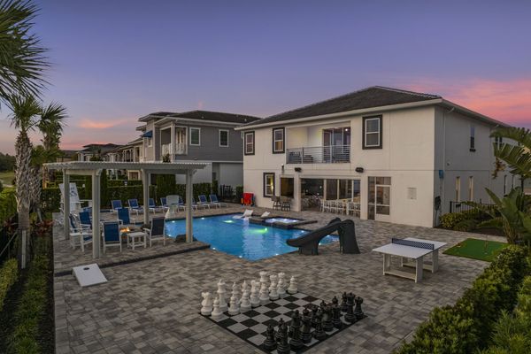 The privacy of this home is truly one of a kind, with nothing but nature surrounding your outdoor entertainment area and pool deck