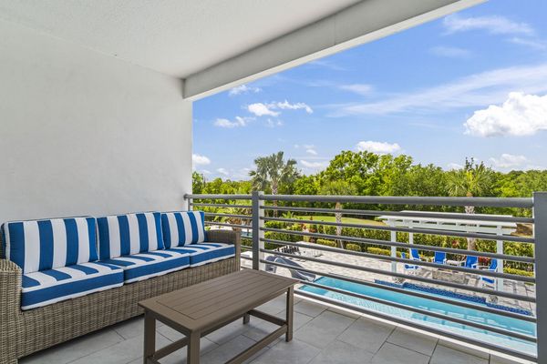Access the second-floor balcony from the loft which has cozy patio seating