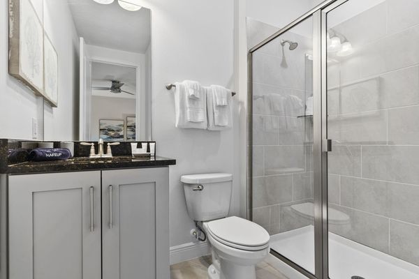 Refresh in the ensuite bath, featuring premium fixtures and a sleek layout.