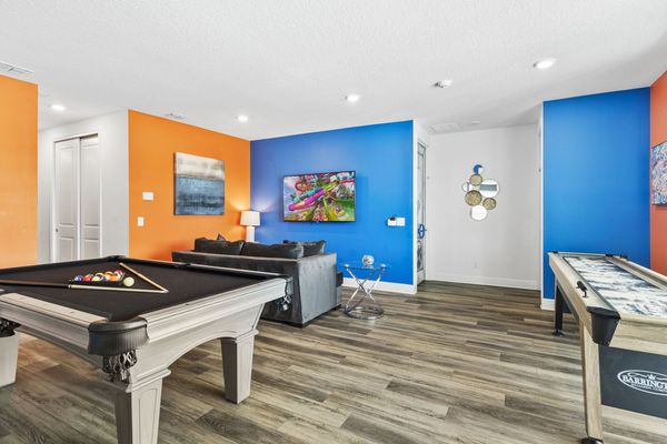 Lounge in the cozy loft area, a versatile space for work or relaxation.