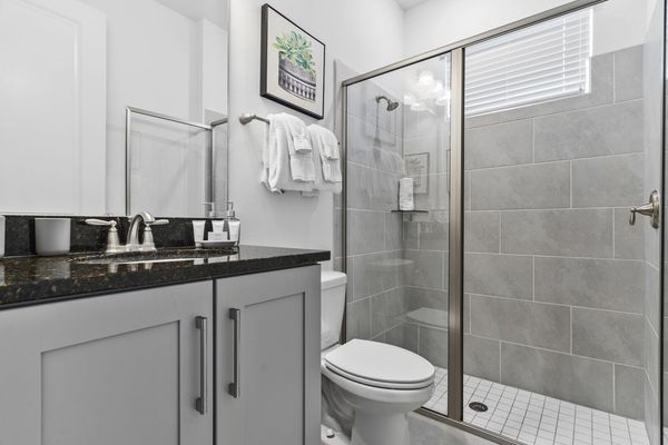 Contemporary bathroom with a glass shower.