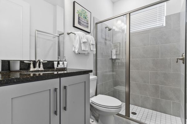 Contemporary bathroom with a glass shower.