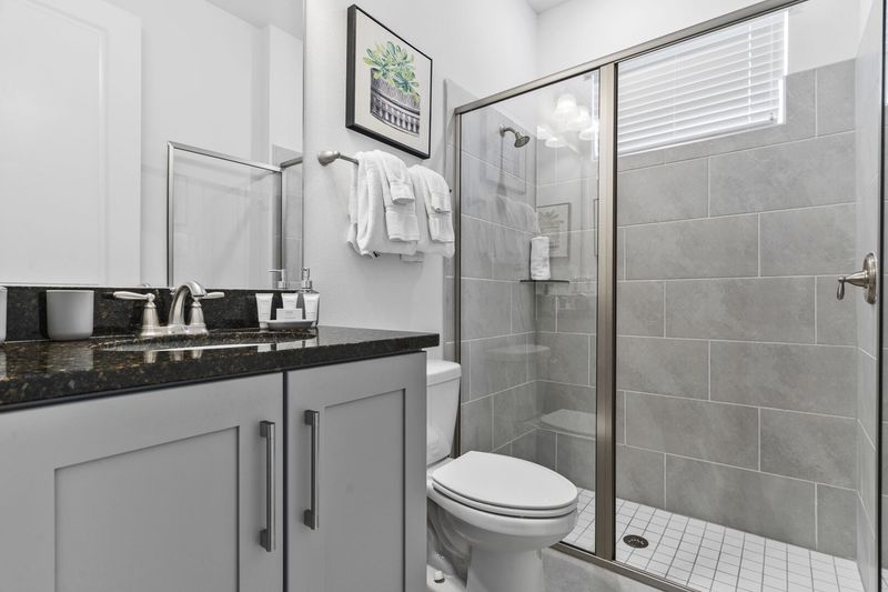 Contemporary bathroom with a glass shower.