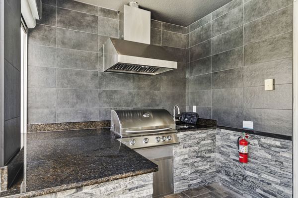 Grilling becomes that much easier with the summer kitchen