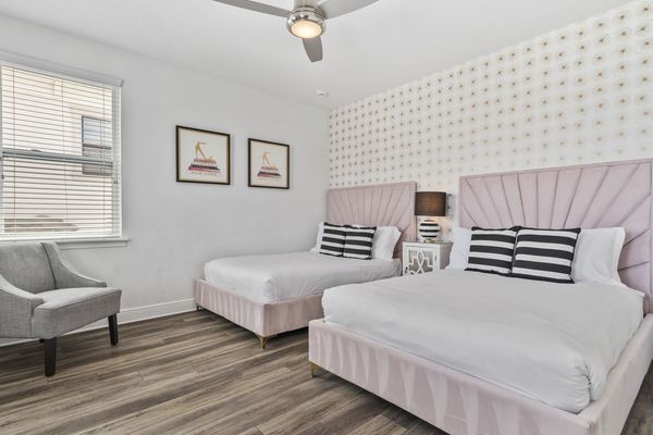 Enjoy the refined bedroom, tailored for comfort with a sleek, minimalist vibe.