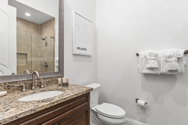 En-suite bathroom with glass door walk-in shower
