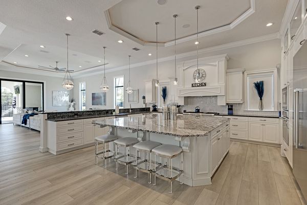 Everyone can be together in this open kitchen with additional seating