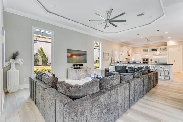 Gather around the second living area with a SMART TV and ample seating