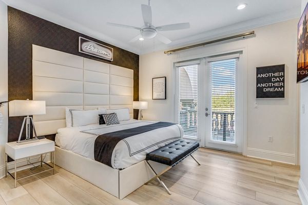 Master Suite # 7. King bed, access to balcony, and en-suite bathroom