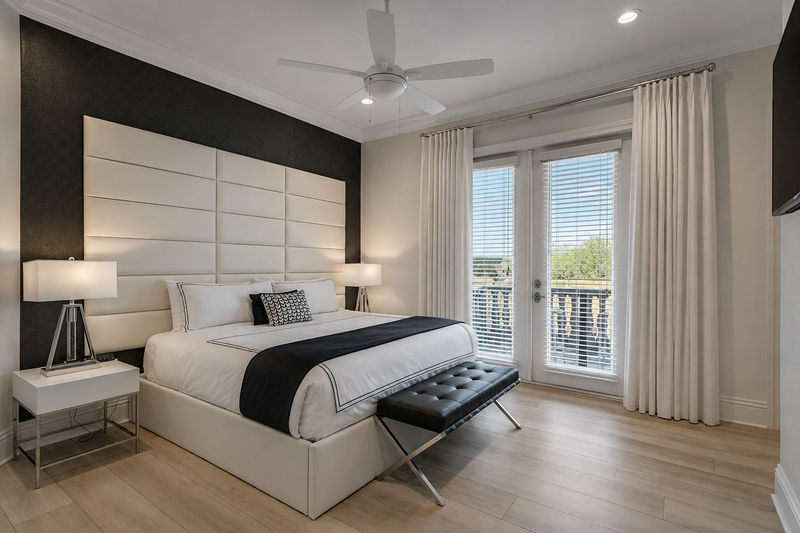 Master Suite # 7. King bed, access to balcony, and en-suite bathroom