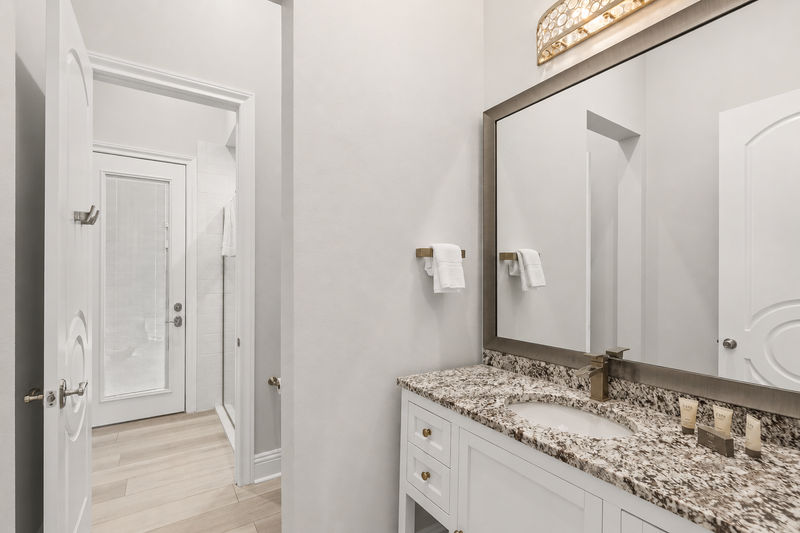 The family bathroom located on the first floor includes a walk in shower. Adjacent to Suite #4.