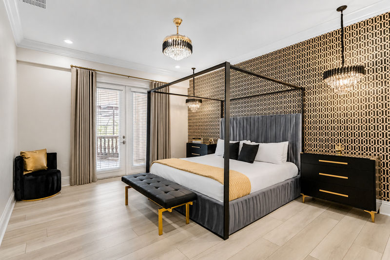 Master suite #8. King size bed, access to balcony, en-suite bathroom, and SMART TV