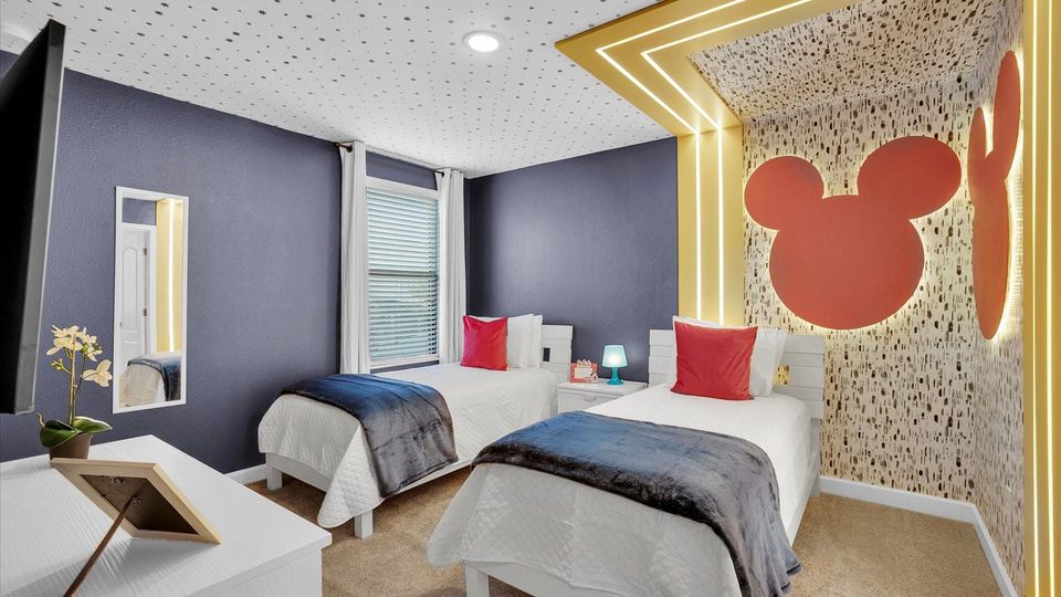 Two Twins Bedroom 8 Upstairs
Shared Bathroom
Mickey
