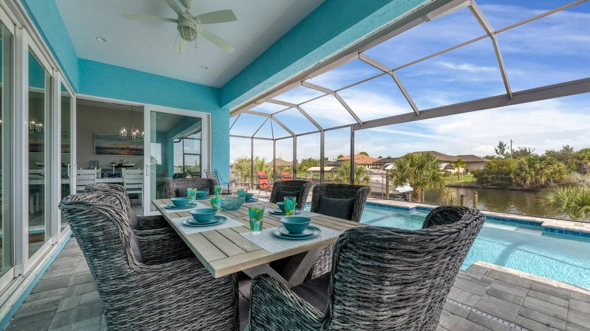 Perfect outdoor space overlooking the pool and canal.