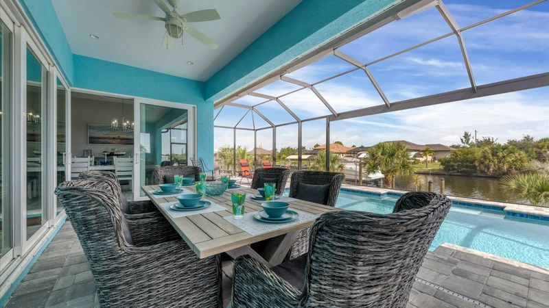 Perfect outdoor space overlooking the pool and canal.