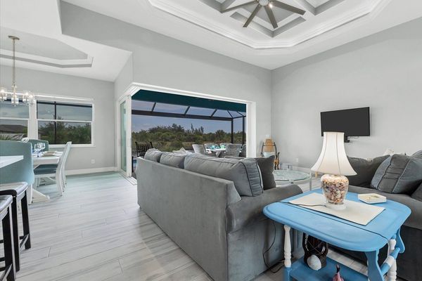 Beautiful views of the pool and canal from the living room