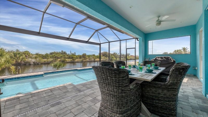 Perfect outdoor space overlooking the pool and canal.