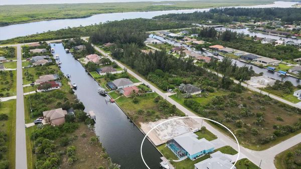 South Gulf Cove property with dock and canal access (Boat lift not available)