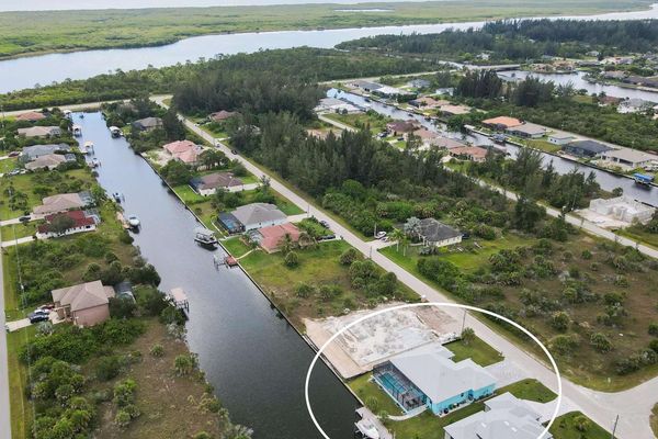 South Gulf Cove property with dock and canal access (Boat lift not available)