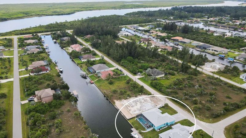 South Gulf Cove property with dock and canal access (Boat lift not available)