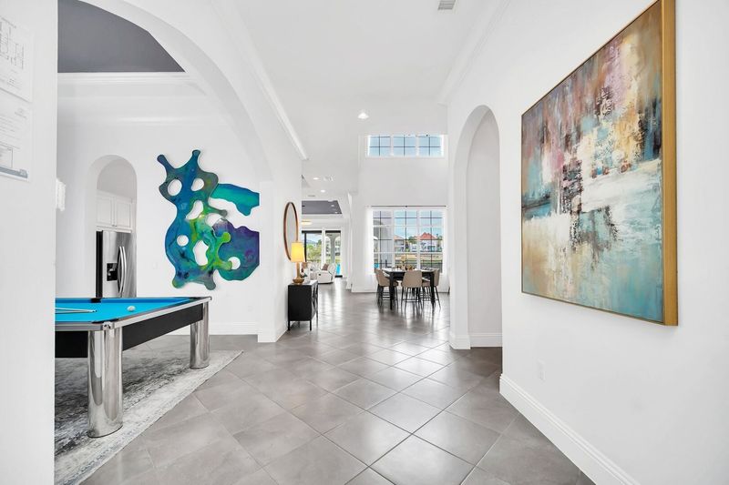 As you step inside, you will immediately be drawn to the inviting pool table, ready for endless hours of leisure and friendly competition.