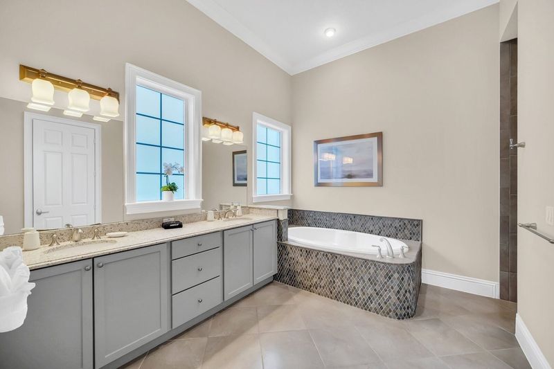 Experience pure relaxation in the en suite, complete with a bathtub for indulgent moments of self-pampering.