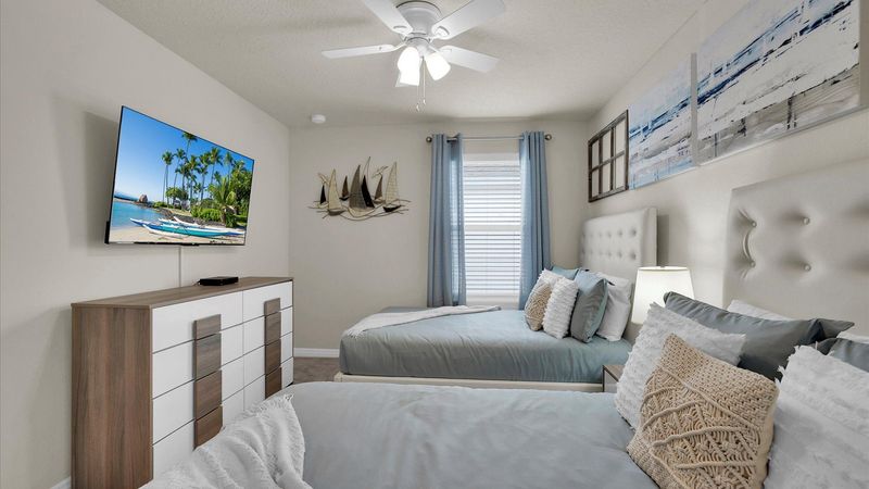 Two Doubles Bedroom 7 (Angle)
55" Roku TV