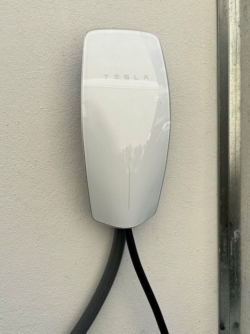 The house comes fully equipped with a Tesla charger!