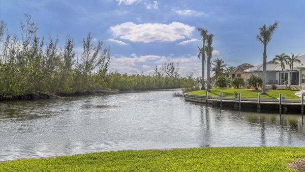 Corner lot on the Punta Gorda Isles canal system (Boat lift not available)
