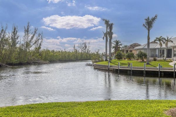 Corner lot on the Punta Gorda Isles canal system (Boat lift not available)