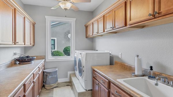 Laundry room with full size washer and dryer