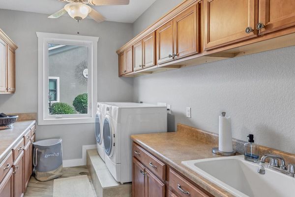 Laundry room with full size washer and dryer