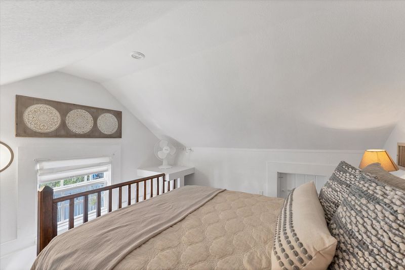 Loft bedroom with queen bed