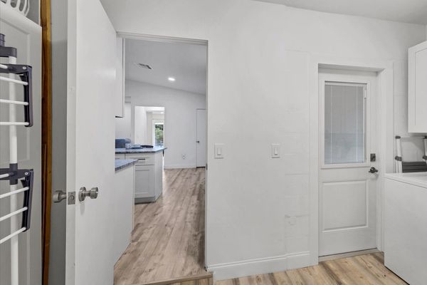 Laundry room. Full size washer & dryer. Entry door to front sidewalk