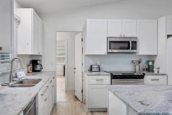beautiful kitchen with granite countertops
