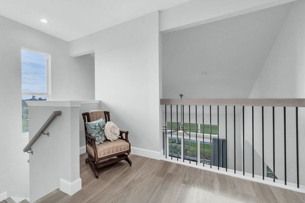 Upstairs landing overlooks the downstairs area