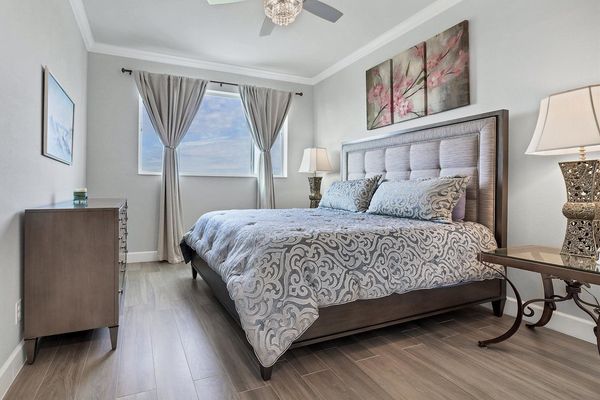 Primary bedroom, upstairs, with attached bathroom, and 40-inch Smart TV