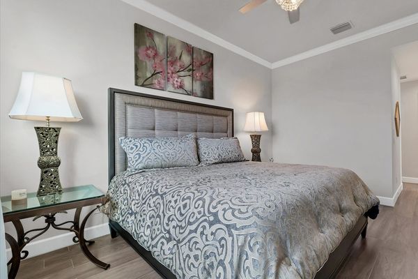 Primary bedroom, upstairs, with attached bathroom, and 40-inch Smart TV